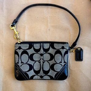 Coach Clutch Black and Beige with Purple Lining